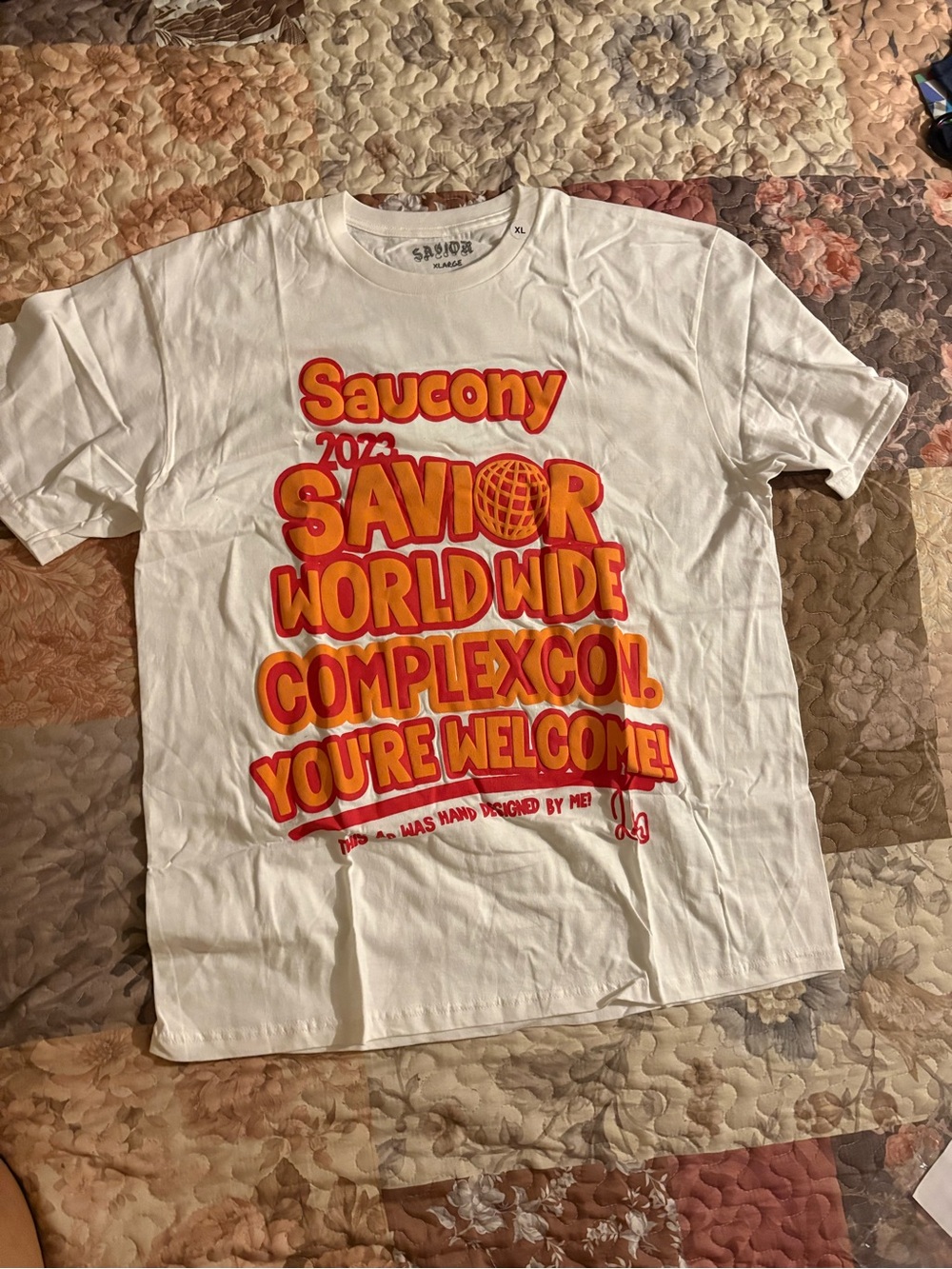 Saucony White Graphic 'Savior Worldwide' Short Sleeve Tee
